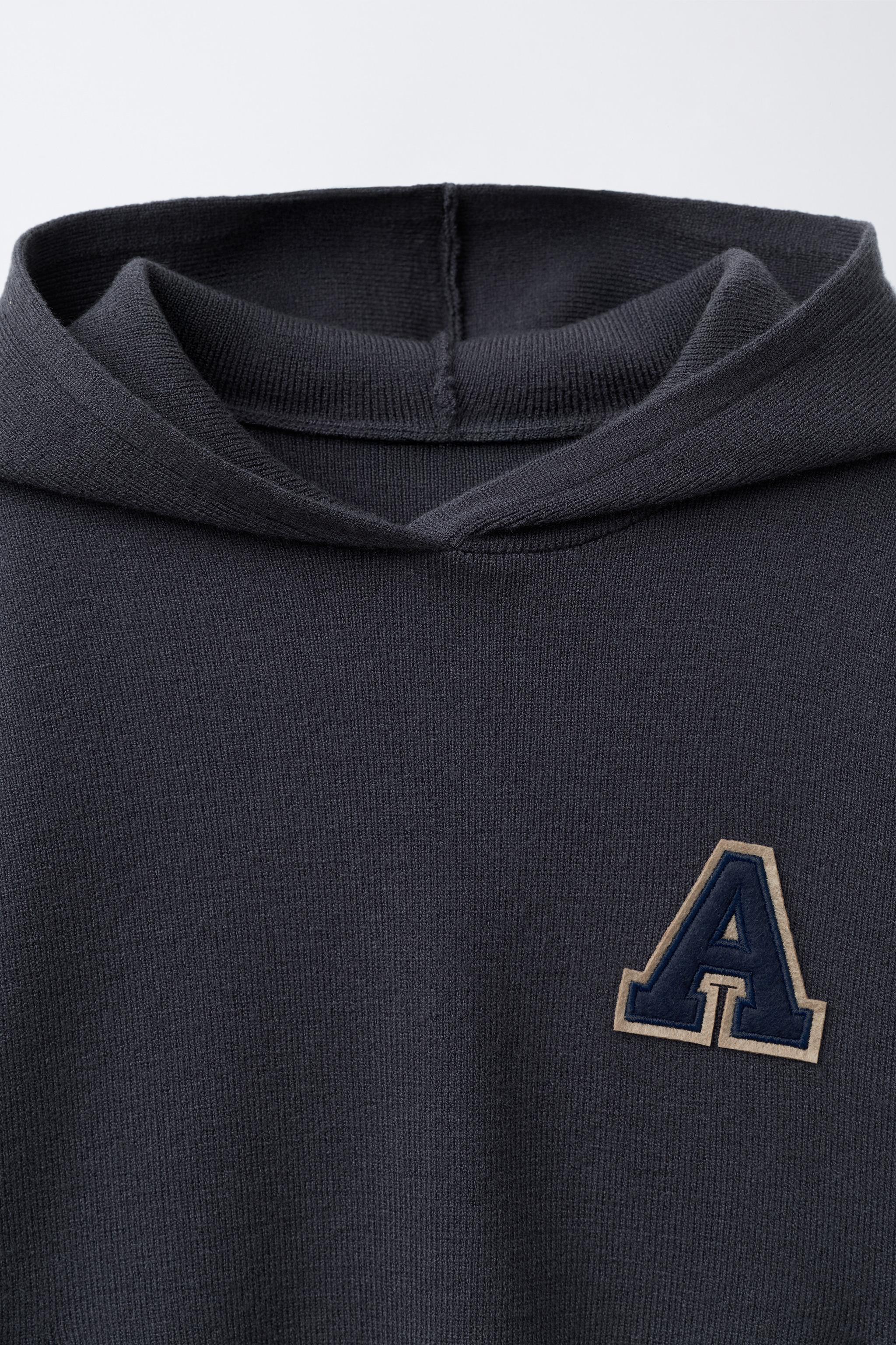 KNIT JUMPER WITH LETTER PATCH